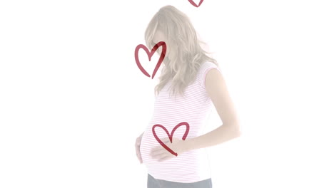 animation of red hearts over smiling pregnant caucasian woman