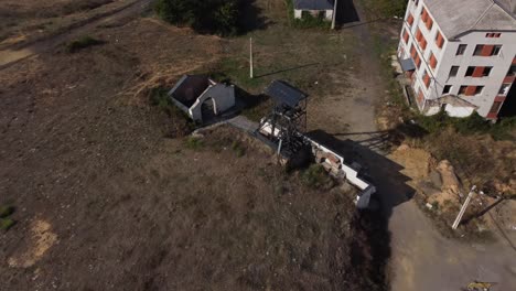 Ancient-mine-tower-and-buildings-of-an-underground-coal-mine-called-Pozo-Viejo-in-Fabero-Aerial-view-2