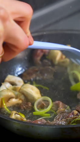cooking stir-fry in a pan