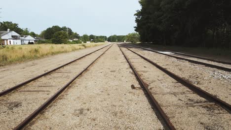 dolly forward along railroad tracks