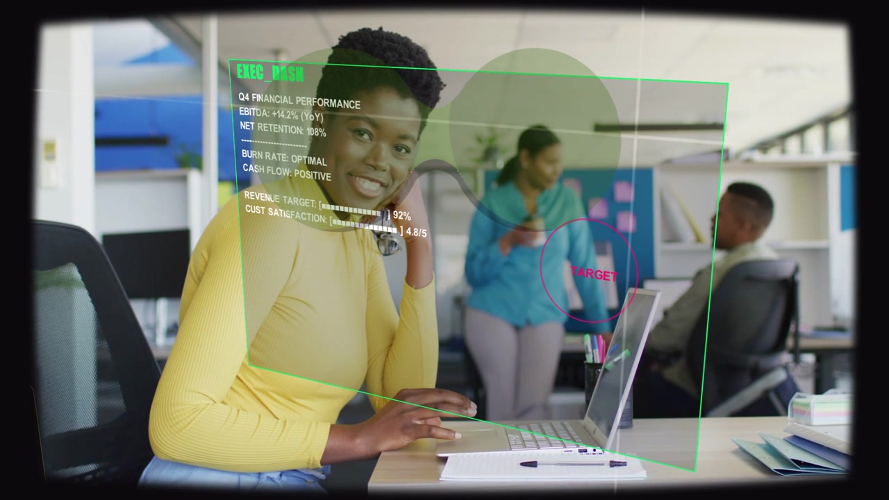Vertical video: Woman in yellow pausing, HUD fading over laptop, reading KPIs, typing for finance