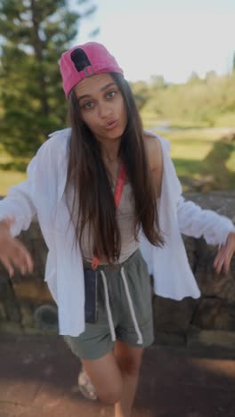 teenage girl dancing outdoors