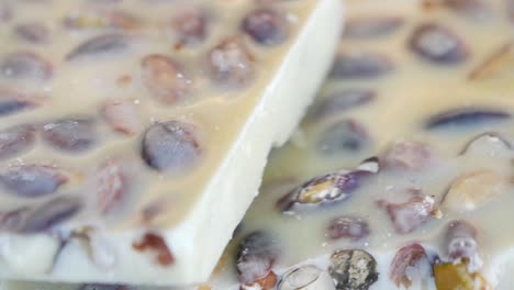 close-up of delicious white chocolate with nuts