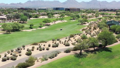 aerial view of a golf course and luxury destination resort