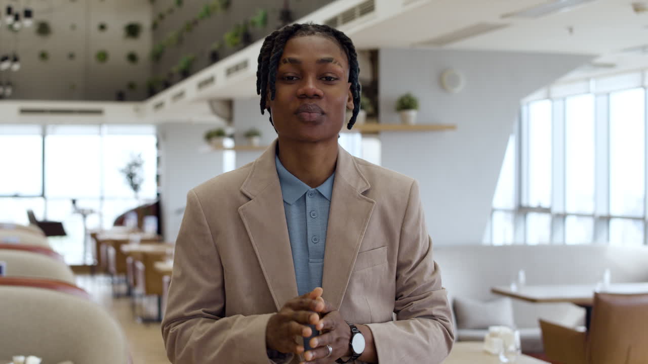 Man Checking Watch in a Restaurant