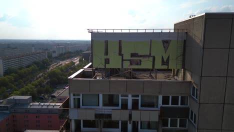 halle neustadt damaged plattenbau prefabricated building, saxony anhalt, germany, damaged buildings. fantastic aerial view flight ascending drone