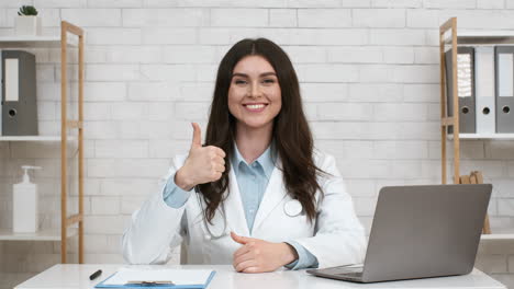 doctor giving a thumbs up during an online consultation.