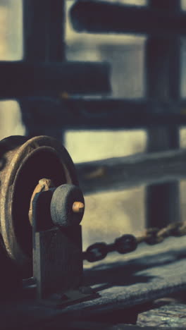 close up of rusty chain and pulley