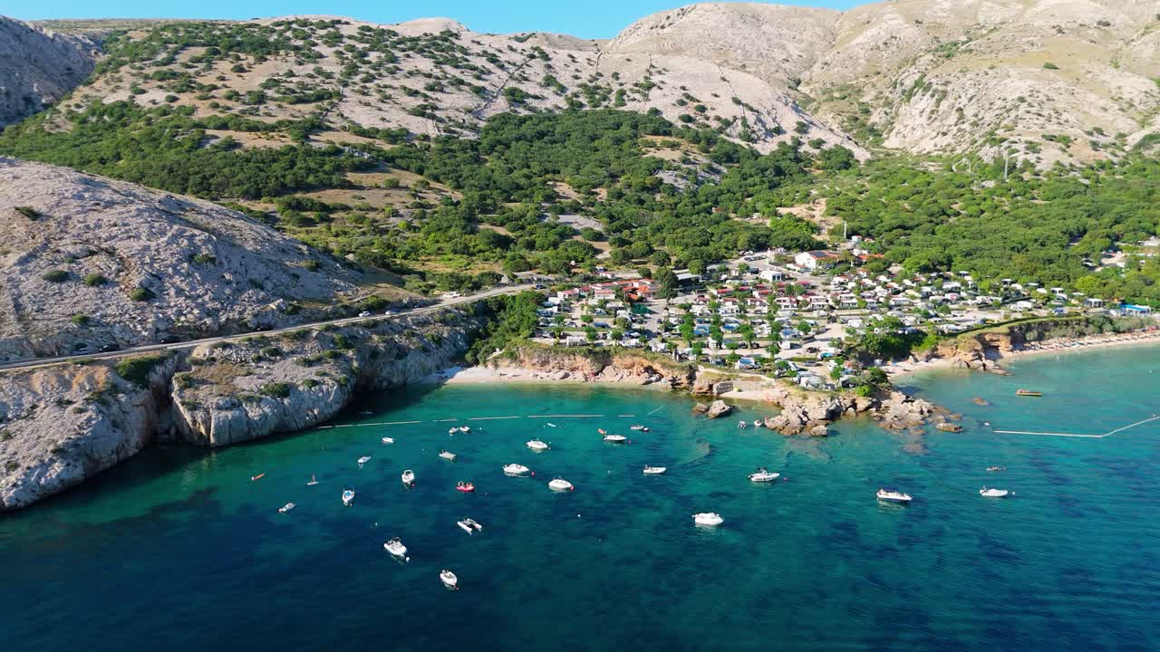 Campsite at Campig Skrila, Krk Island, Stara Baska Croatia, Aerial View of the Mountains and Coast With Boats, Beaches and Adriatic Sea. The Seaside Rv Campmobiles on a Summer Beautiful Coastline