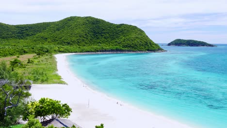 Above-view-of-the-beach-and-the-coral-reefs-in-the-beautiful-blue-sea-and-good-atmosphere-with-sea-breezes-suitable-for-relaxation-tropical-vacation