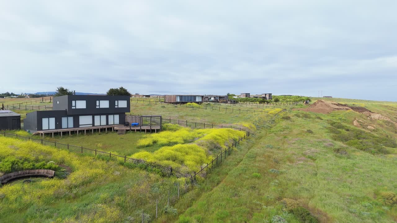 Modern Houses on a Coastal Cliffside