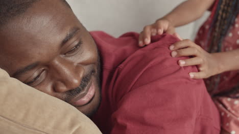african man enjoying massage