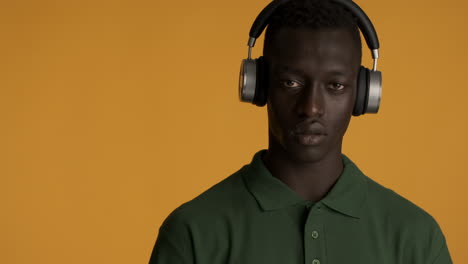 african american man on yellow background.