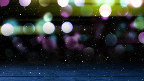 Animation-of-snow-falling-over-light-spots-at-christmas