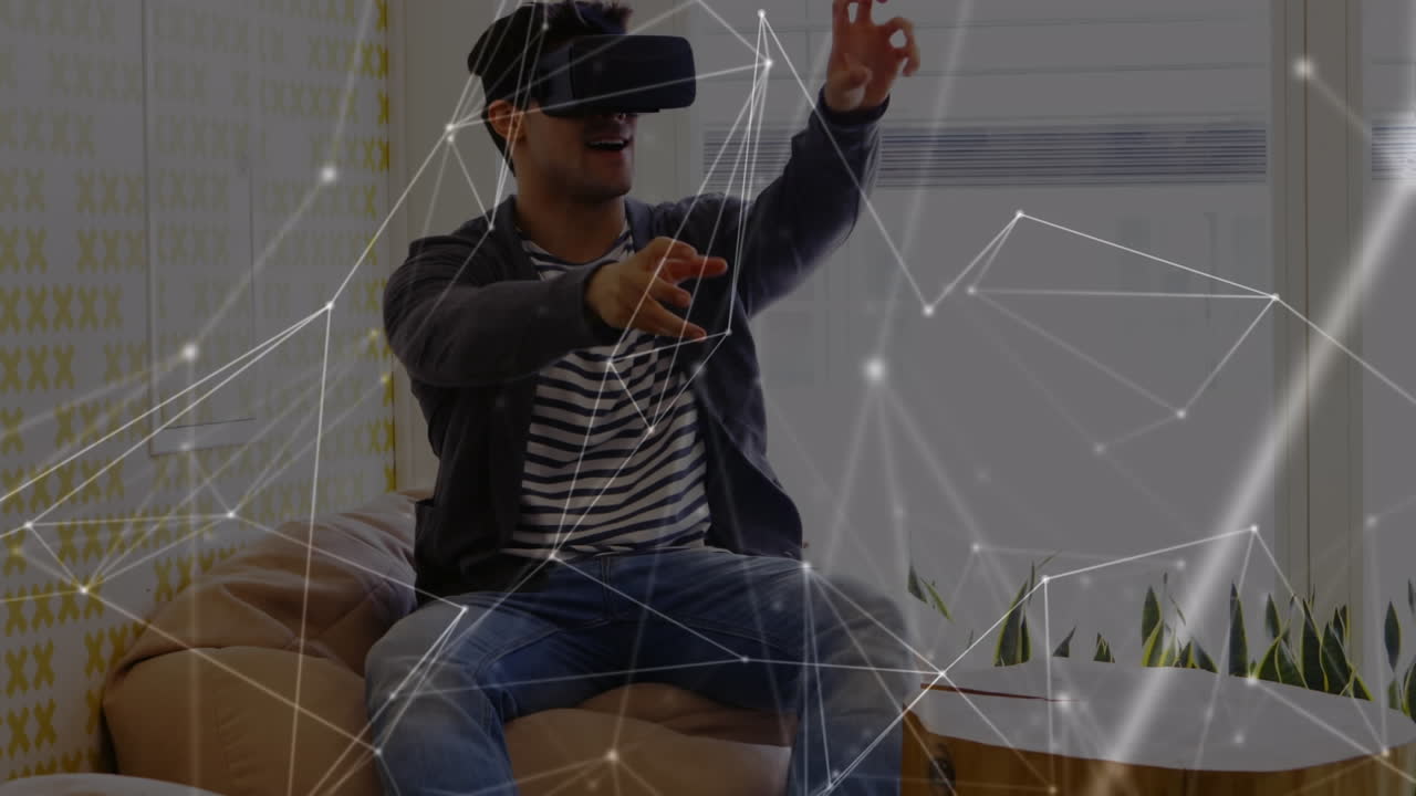 Animazione di una rete di connessioni sopra un uomo d'affari che indossa visori VR