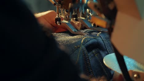 detail image from sewing jeans in jeans production factory