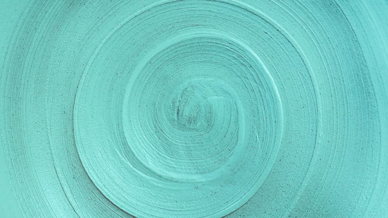 close-up view seamless looping rotation of spiral lines. trendy Aqua Menthe color and abstract background of infinity with copy space