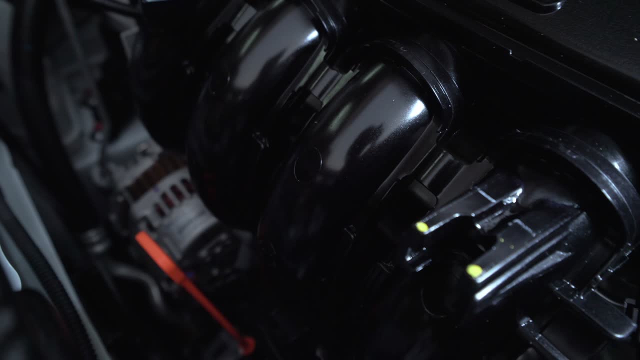 Closeup detailed view of new car engine compartment, Dolly shot