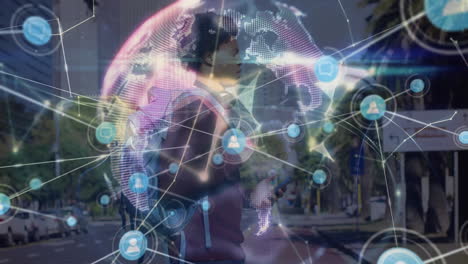 Animation of network of connections with globe over african american man using smartphone