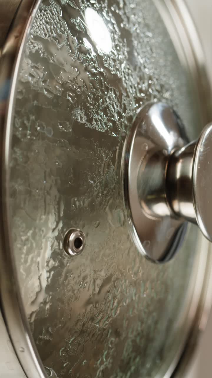 Close-up of Condensation on a Glass Pot Lid
