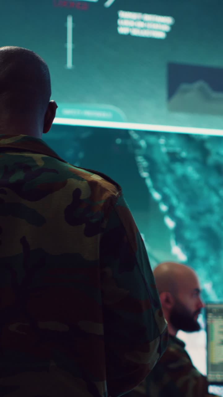 Military Soldiers Working in High-Tech Command Center