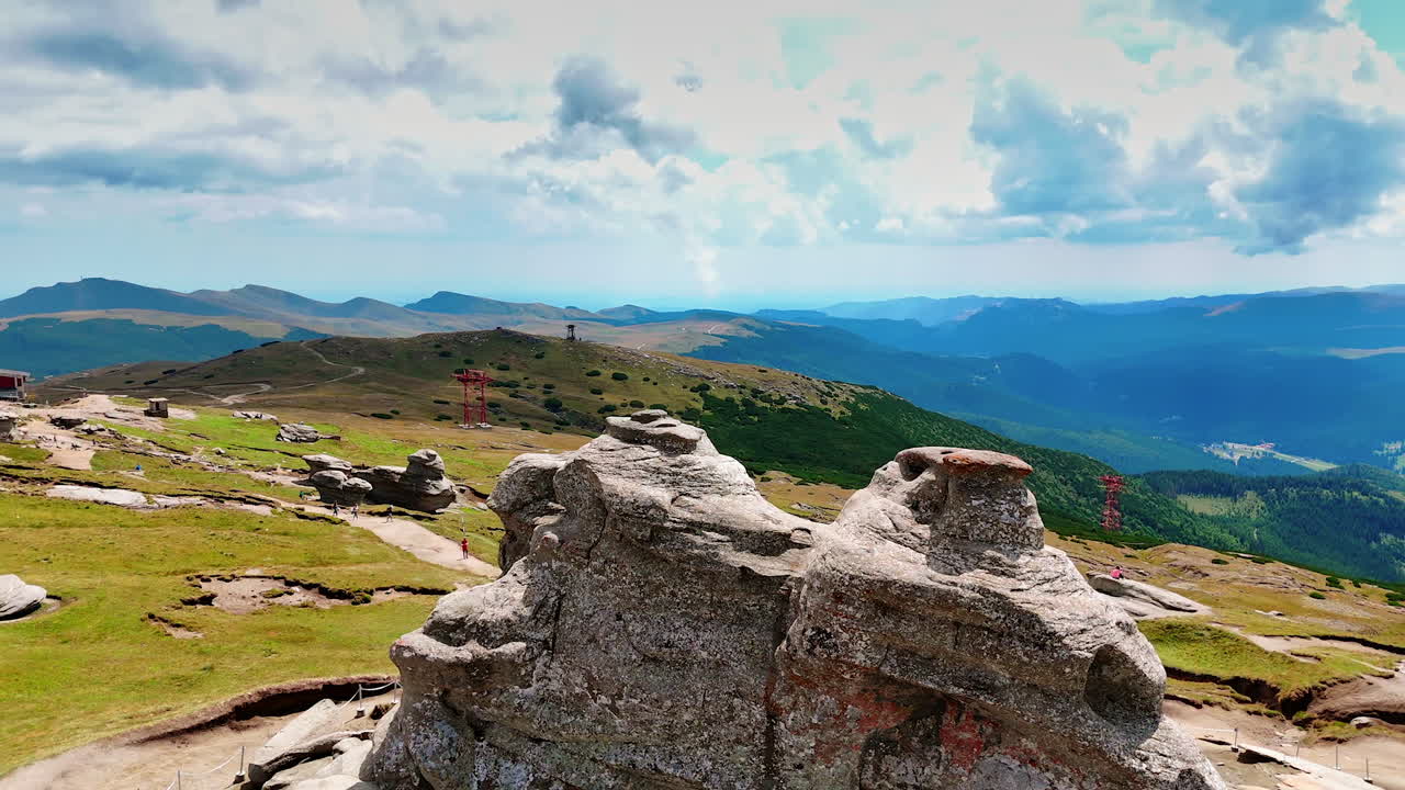 Rock formations on Caraiman Plateau in Romania. Unusual weathered rock formations stand on the Caraiman Plateau in Bucegi Mountains