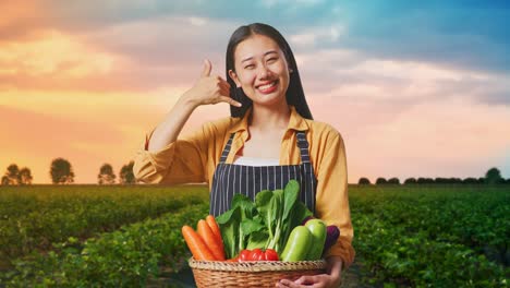 smiling farmer holding basket of fresh vegetables