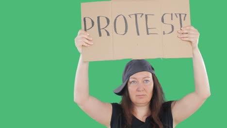 woman raising protest sign during political demonstration or strike