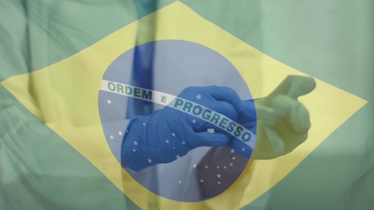 Animação da bandeira do Brasil sobre as mãos de um médico colocando luvas cirúrgicas.