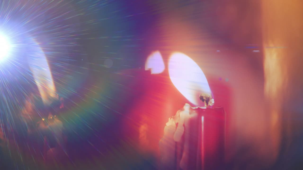 Blue flash sparking burning red candle flickering, melting wax dripping, creating vivid light dance