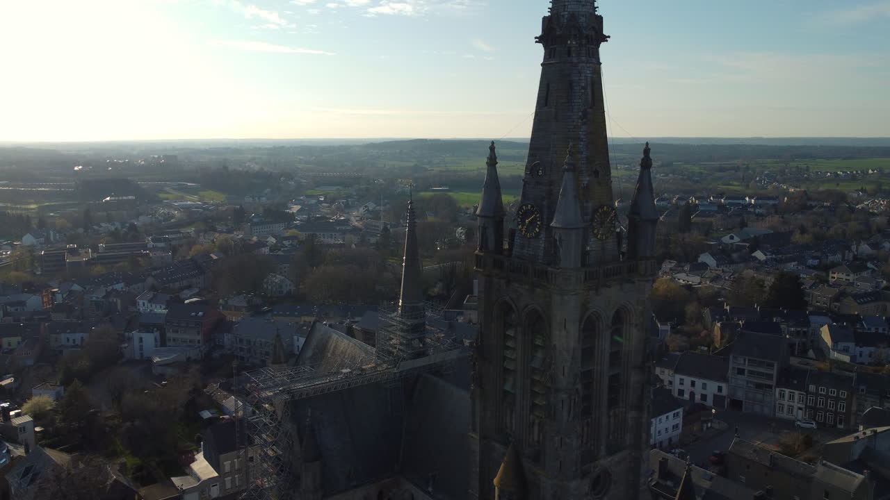 Aerial view of a church tower in a Belgian town