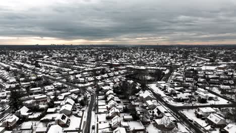 Una-Vista-Aérea-De-Un-Barrio-Suburbano-Después-De-Que-Nevó