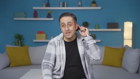 man combing his hair.