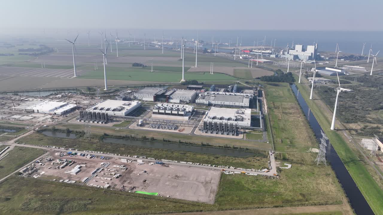 Aerial View of a Wind Farm and Power Plant