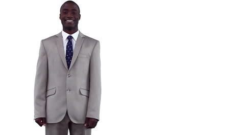 businessman smiling while looking at the camera