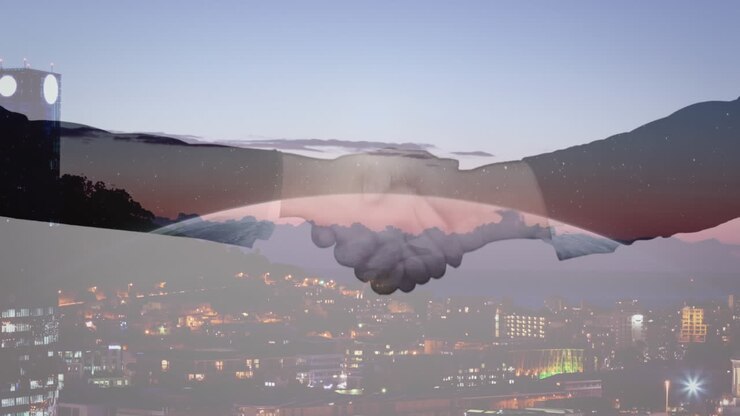 Handshake with city in background