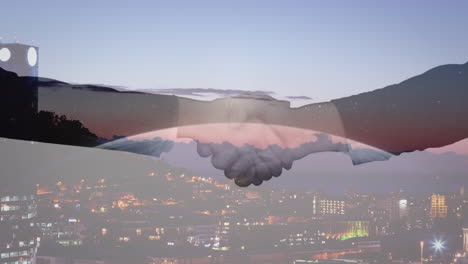 handshake with city in background