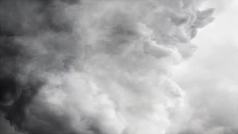 4k cumulonimbus cloud in the moving gray sky