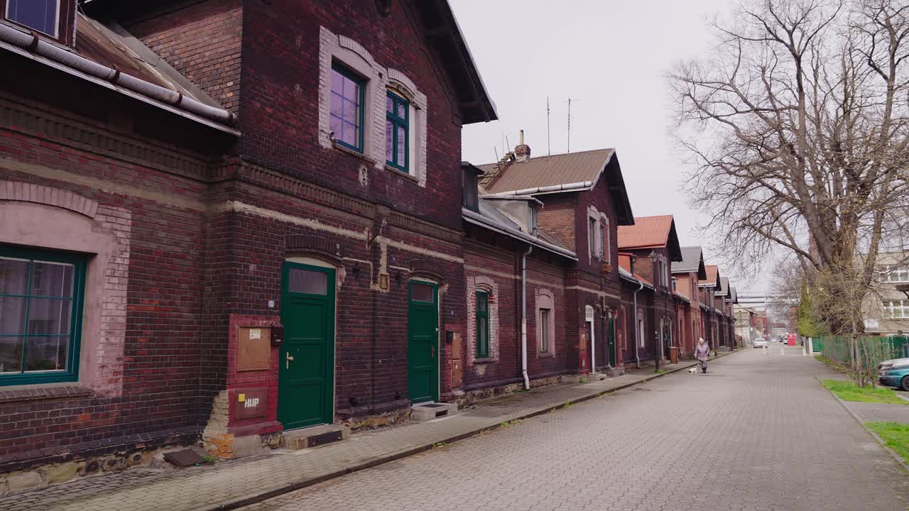 A shot of the street and red brick houses of the former 19th century workers' colony in Ostrava V&iacute;tkovice