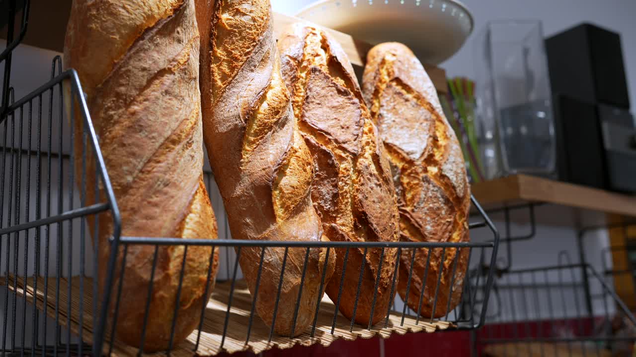 Freshly Baked Golden Baguettes Displayed in a Bakery