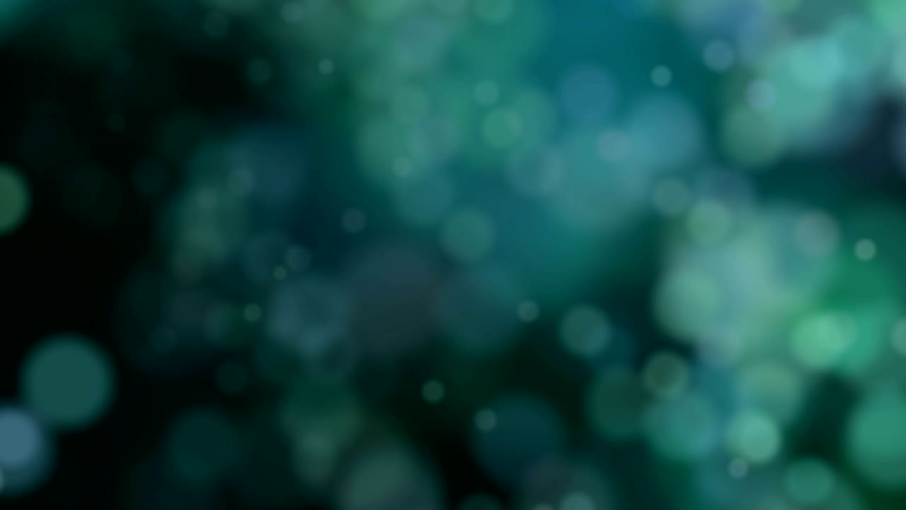 círculos verdes borrosos cayendo hacia abajo.