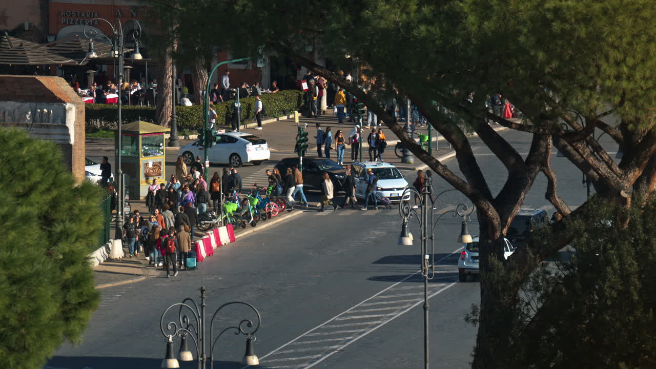 City street view of Rome in daylight, with people walking on the background, Italy
