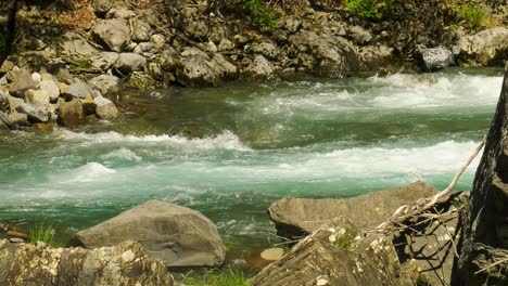 cold blue waters of mountain stream, pyrenees spain