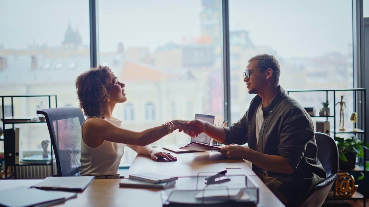 Business partners handshake office meeting, man woman closing deal celebration