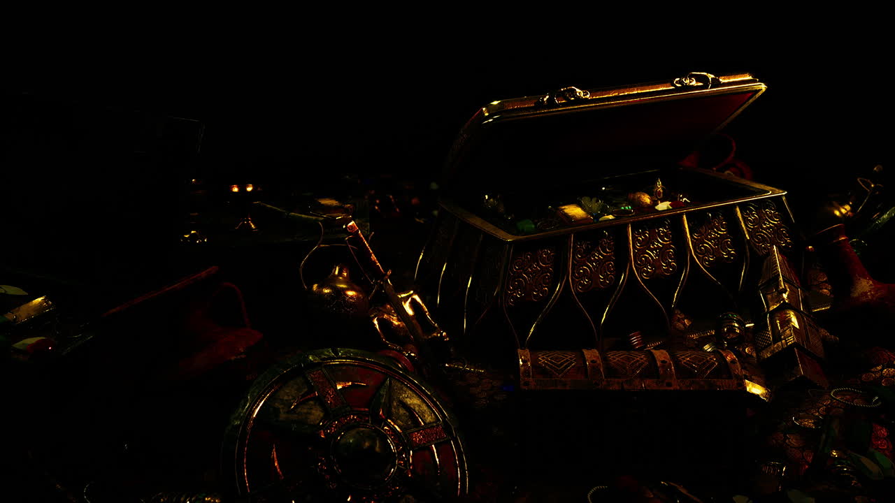 어 ⁇  속에서 보석과 금 동전을