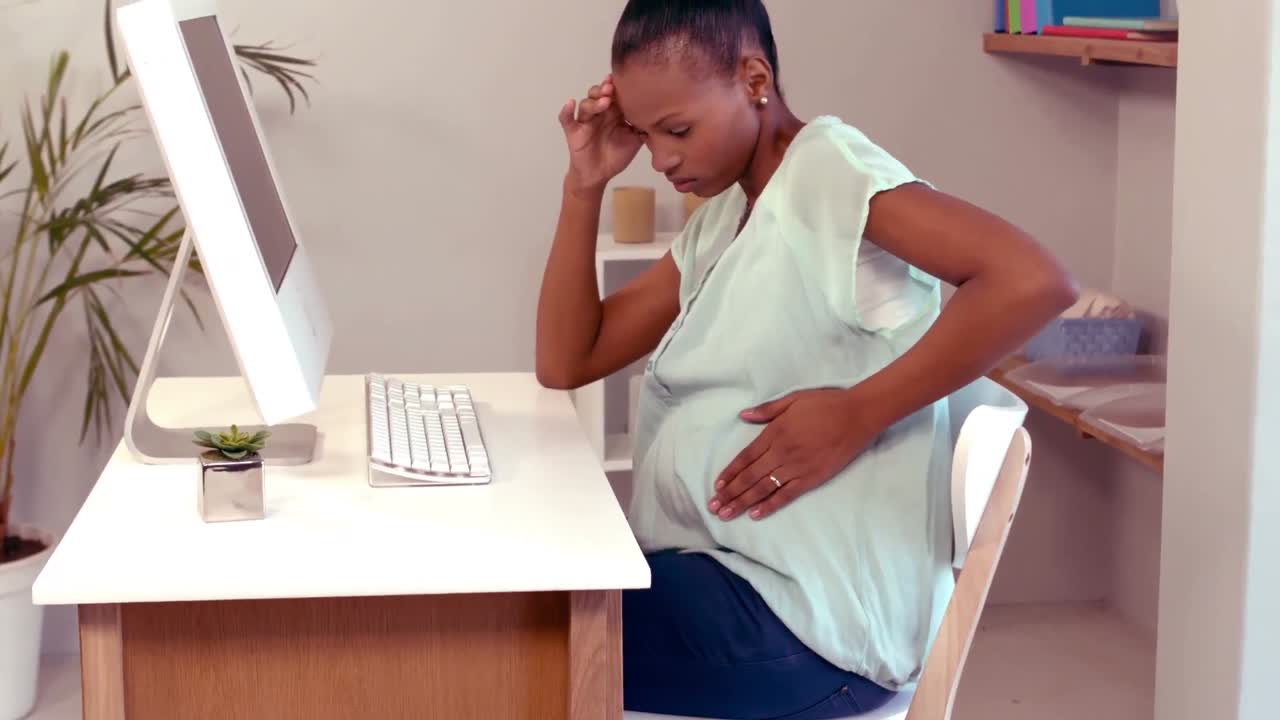 Tired pregnant woman having pain