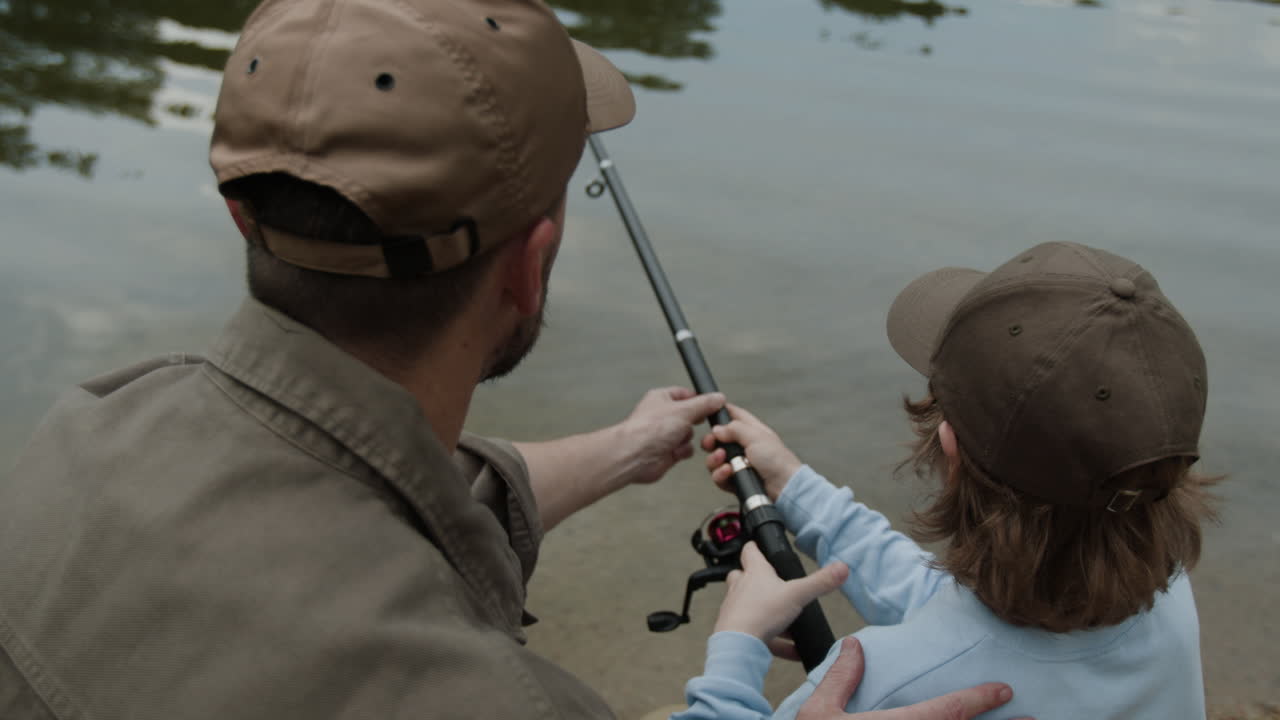 Father and Child Fishing at the Lake