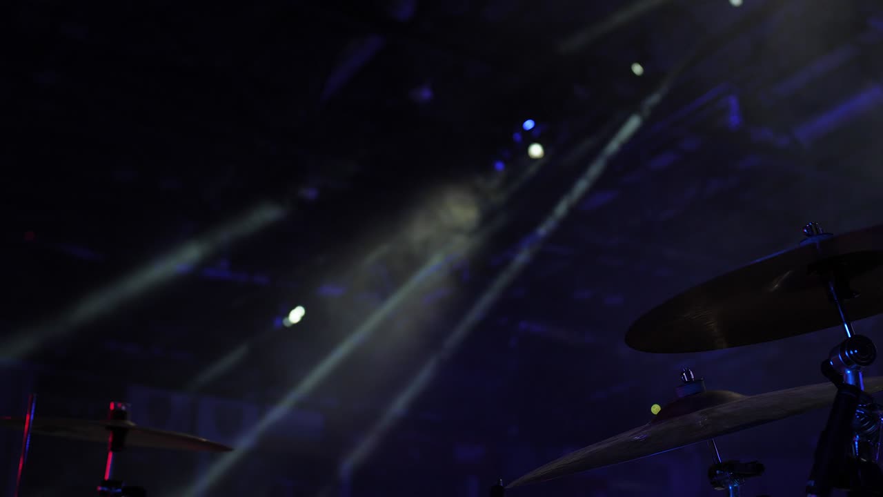 Drum kit against the background of stage lights
