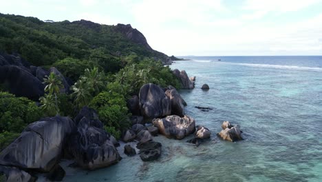 la digue island in seychelles in the coast of indian ocean, drone shot
