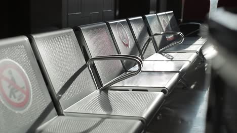 Close-up-photo-of-stainless-steel-chairs-installed-in-a-public-area-for-the-client-of-a-veterinary-hospital